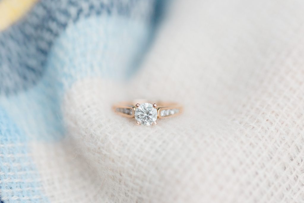 ring picture on cream coloured scarf | Ottawa engagement photographer