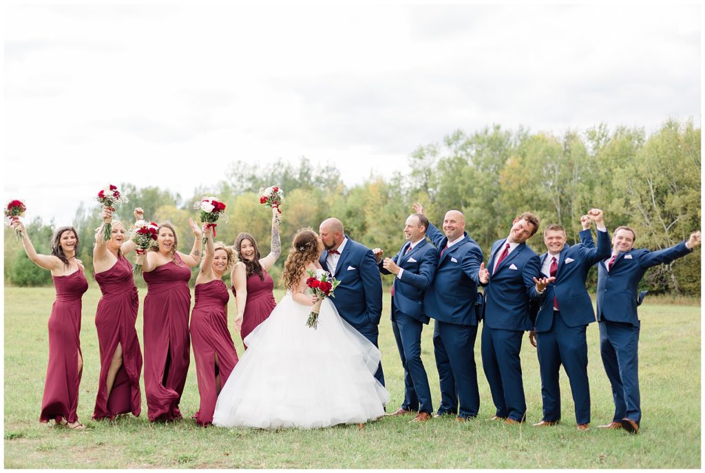 full bridal party wearing navy and burgundy at beckwith trail wedding in carleton place