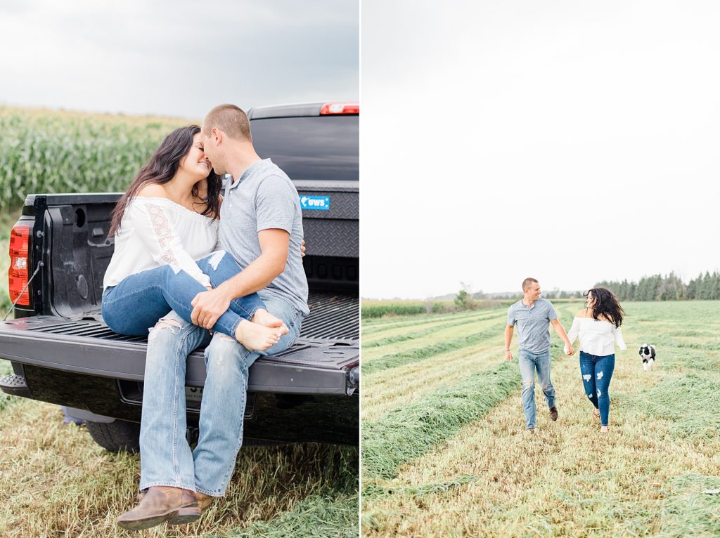 couple running in a hay field and cuddling up in the bed of his truck