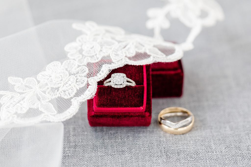 wedding rings in burgundy ring box at pakenham wedding