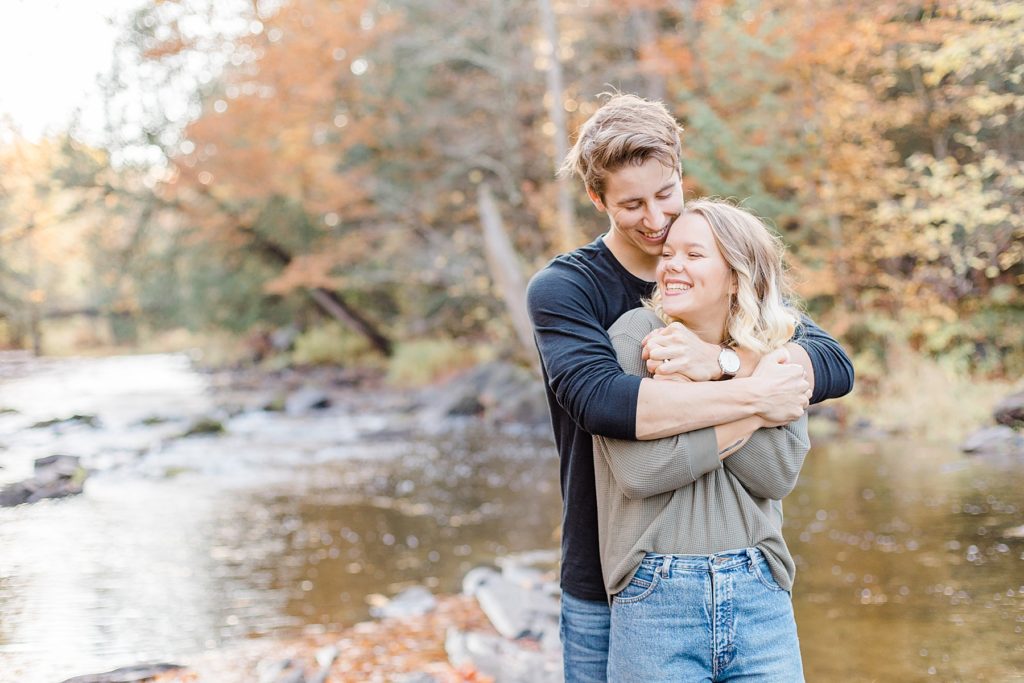 fall infused engagement session by the water