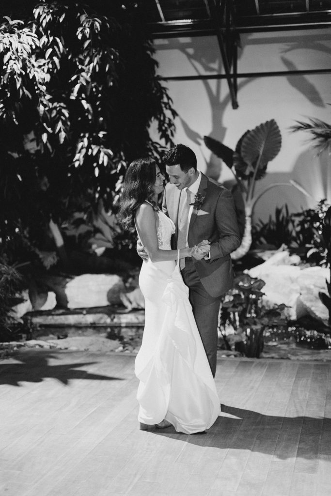 bride and groom first dance at Aquatopia wedding photographed by Brittany Navin Photography