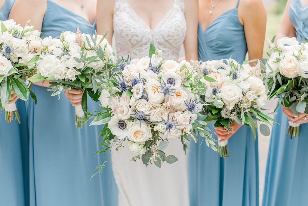 close up of bridal party holding their bouquets from acanthus florals at Ottawa wedding 