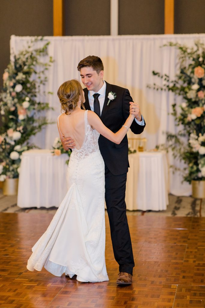bride and grooms first dance during reception in Newbridge hall at Brookstreet Hotel Wedding in Ottawa with Brittany Navin Photography
