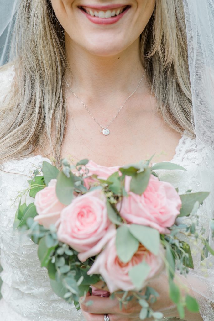 close up of sentimental necklace bride is wearing at Wedding with Brittany Navin Photography in Almonte, Ontario