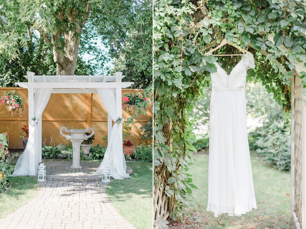 Ceremony altar paired with a photo of wedding dress hanging outside At The Schoolhouse wedding in munster ontario photographed by Brittany Navin Photography