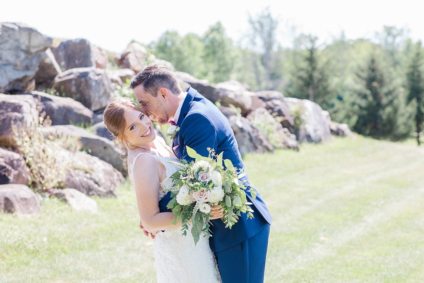 bride and groom portrait at timber run golf course wedding in Lanark, Ontario photographed by Brittany Navin