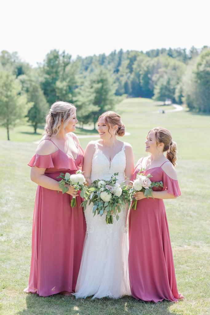 bride and bridesmaids wearing dusty rose