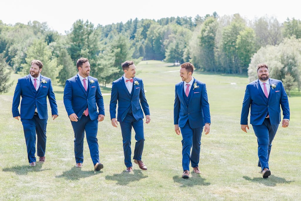 groomsmen and groom wearing navy suit and dusty pink ties at lanark wedding