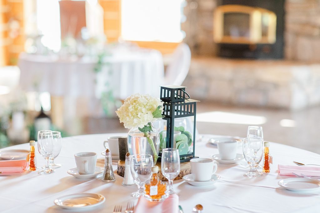 table set up for reception at timber run golf course wedding in Lanark, Ontario photographed by Brittany Navin