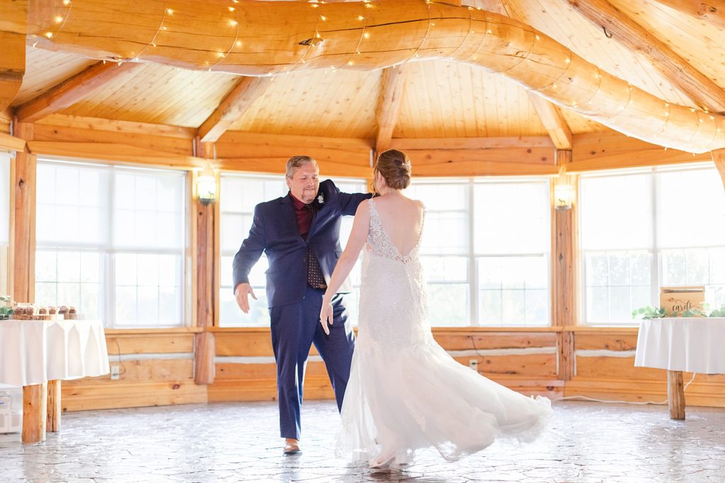 father daughter dance at timber run golf course wedding in Lanark, Ontario photographed by Brittany Navin