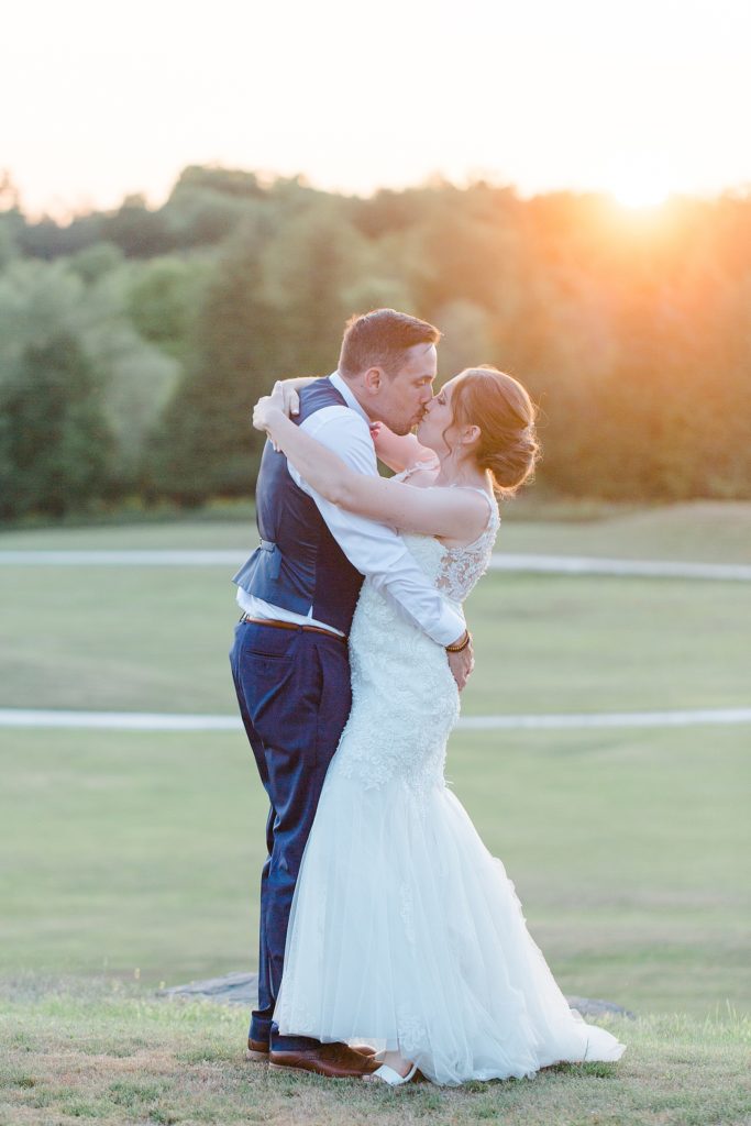 bride and groom during sunset at timber run golf course wedding in Lanark, Ontario photographed by Brittany Navin