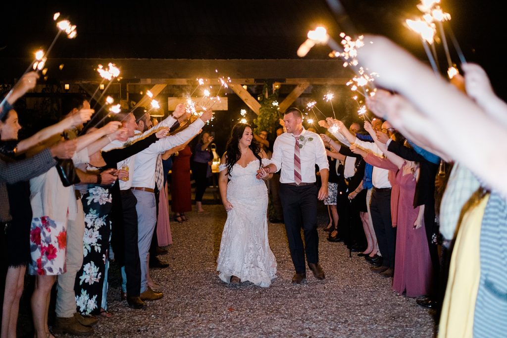 sparkler exit at Adelina Barn Wedding Photographed By Brittany Navin Photography