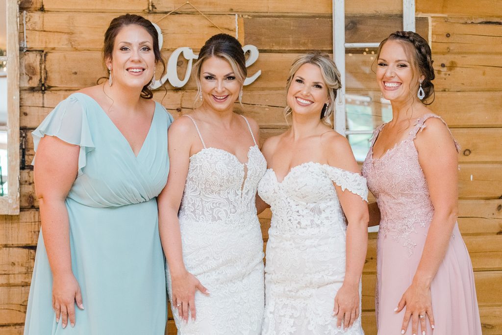 brides with their maid of honours at bean town ranch double wedding photographed by Brittany Navin Photography