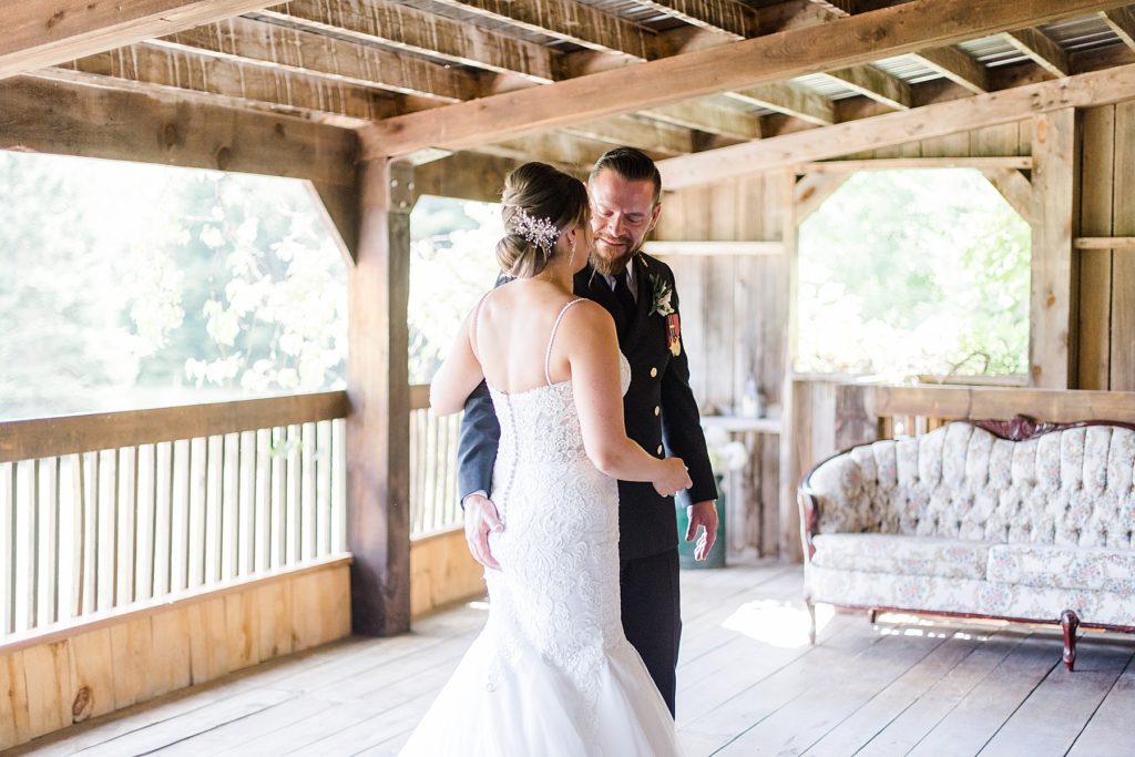 first look reaction at bean town ranch double wedding photographed by Brittany Navin Photography