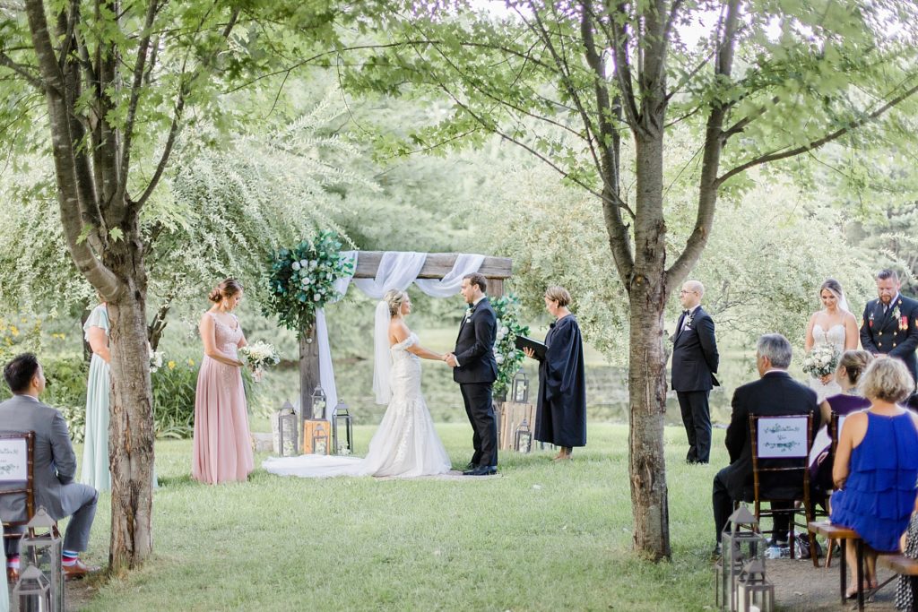 ceremony at bean town ranch double wedding photographed by Brittany Navin Photography