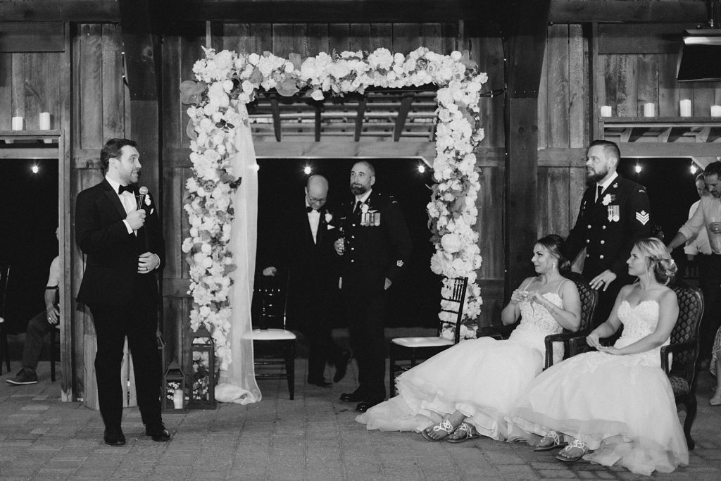 speeches during reception at bean town ranch double wedding photographed by Brittany Navin Photography