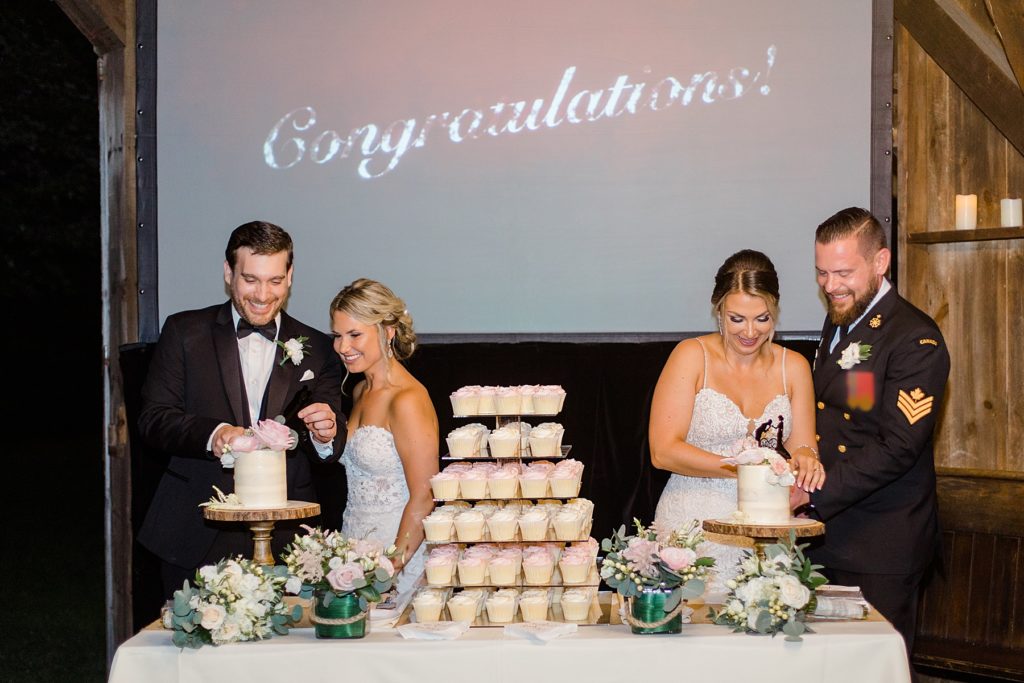 both couples cuttin their cake during the reception at bean town ranch double wedding photographed by Brittany Navin Photography