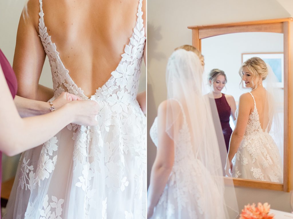 bride seeing herself for the first time after getting ready at Calabogie Peaks wedding photographed by Brittany Navin Photography