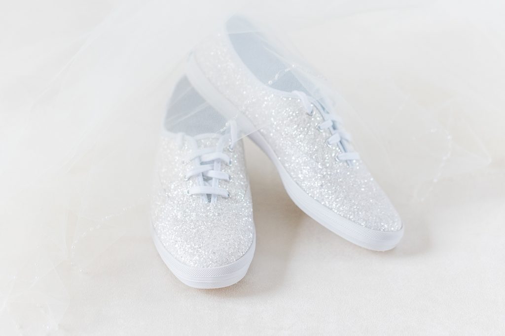 sparkly keds detail photo for temples sugar bush wedding photographed by Brittany Navin Photography