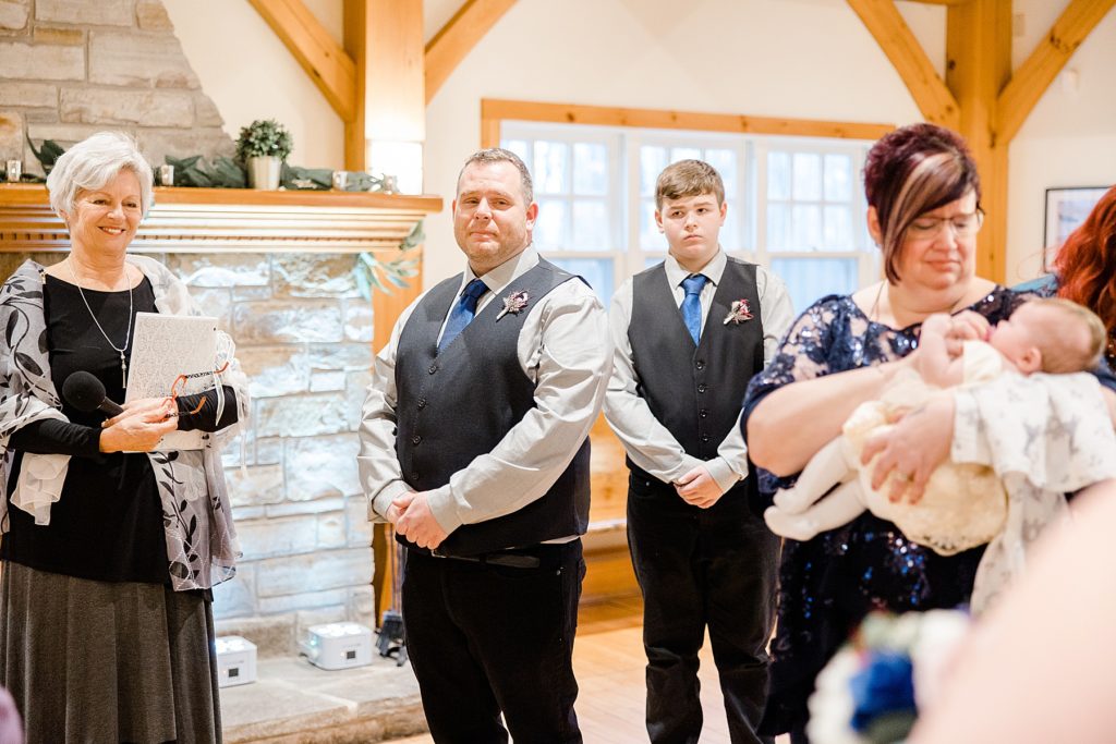 groom waiting for the bride at the altar during temples sugar bush wedding photographed by Brittany Navin Photography