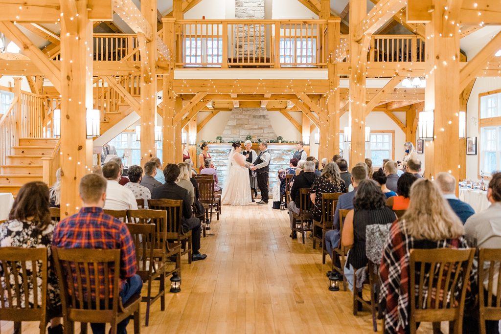 indoor ceremony at temples sugar bush wedding photographed by Brittany Navin Photography