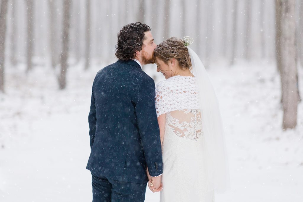 bride and groom portrait for temples country winter wedding photographed by Brittany Navin Photography