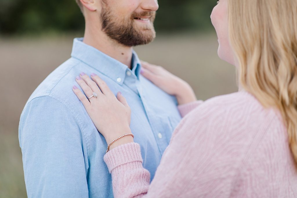 close up of engagement ring on her hand at Arnprior engagement session at Gillies Grove photographed by Brittany Navin Photography