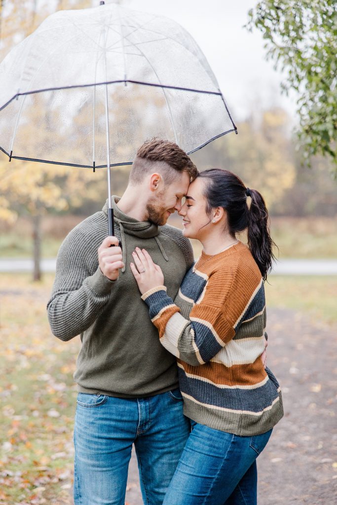 rainy autumn engagement session  at the mill of kintail in mississippi mills photographed by Brittany Navin Photography