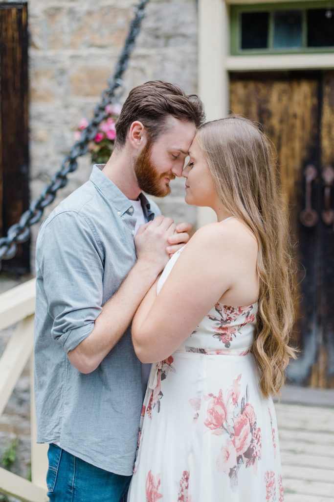 couple forehead to forehead at mill of kintail engagement session photographed by Brittany Navin Photography