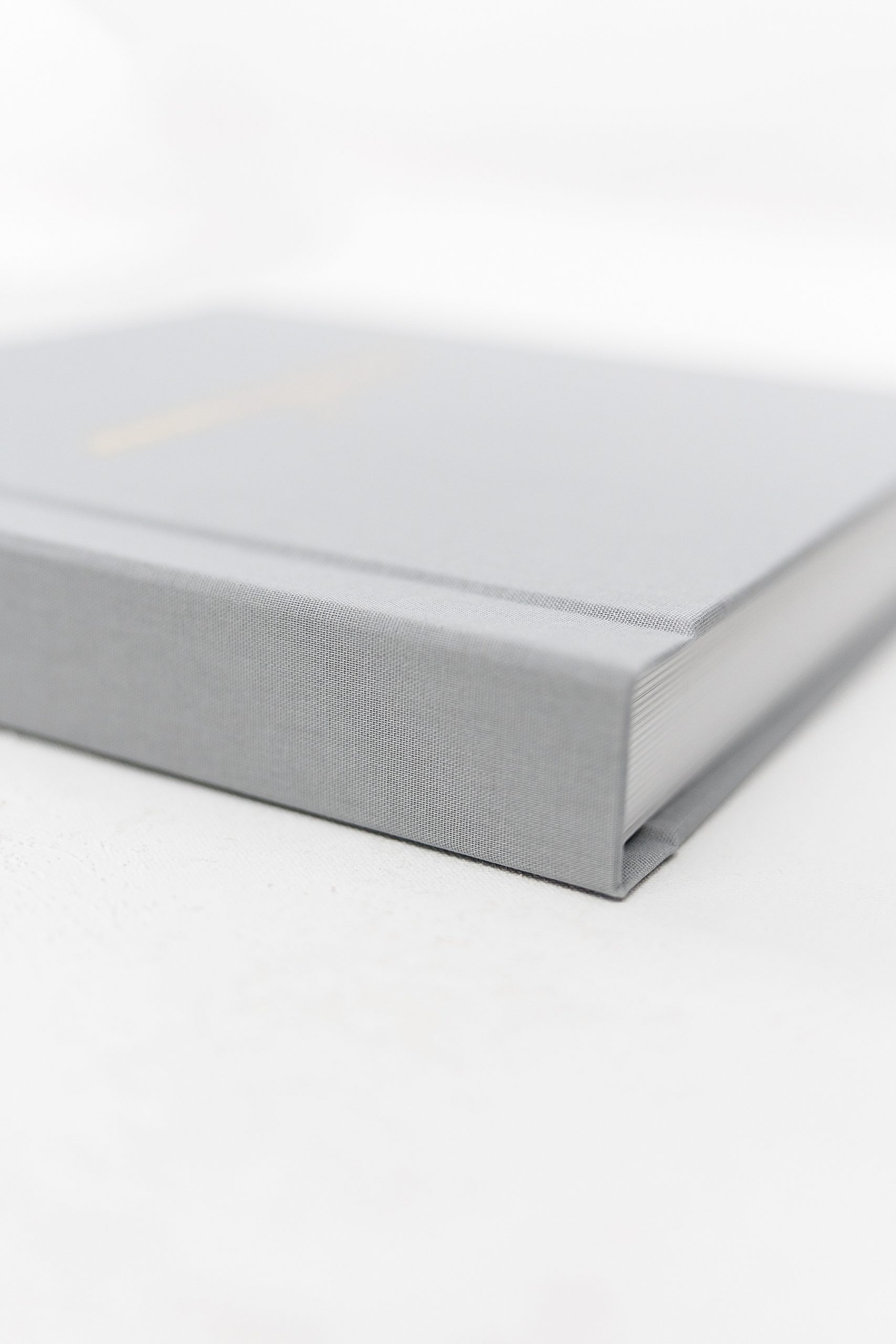image of the thickness of an heirloom wedding album. Dekora albums. Brittany Navin Photography