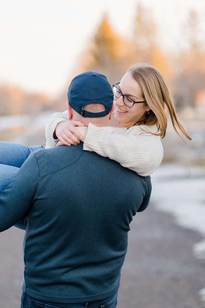 baby carry at Downtown Almonte Engagement Session photographed by Brittany Navin Photography