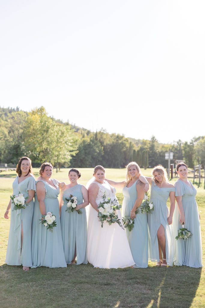 bridesmaid portrait from calabogie peaks summer wedding photographed by Brittany Navin Photography