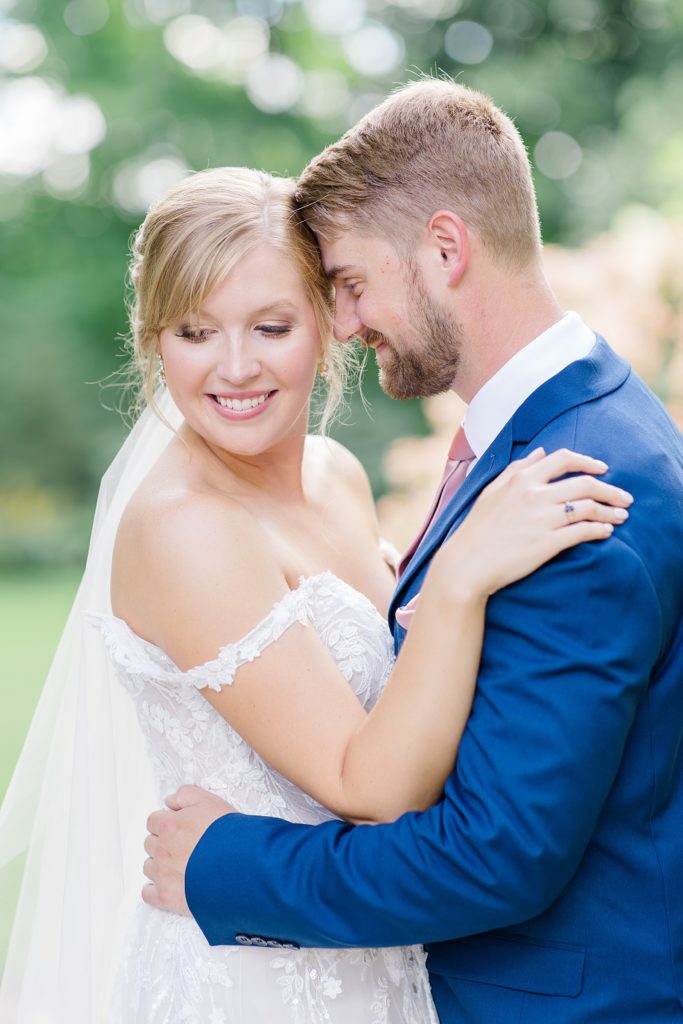 Bride and Groom Portraits in garden of Temple's Country Wedding photographed by Brittany Navin Photography 