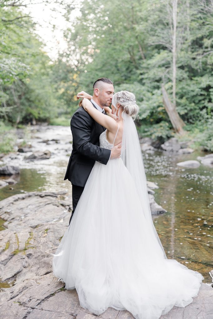 bride and groom portraits at micro Mill of Kintail wedding in Almonte, Ontario photographed by Brittany Navin Photography