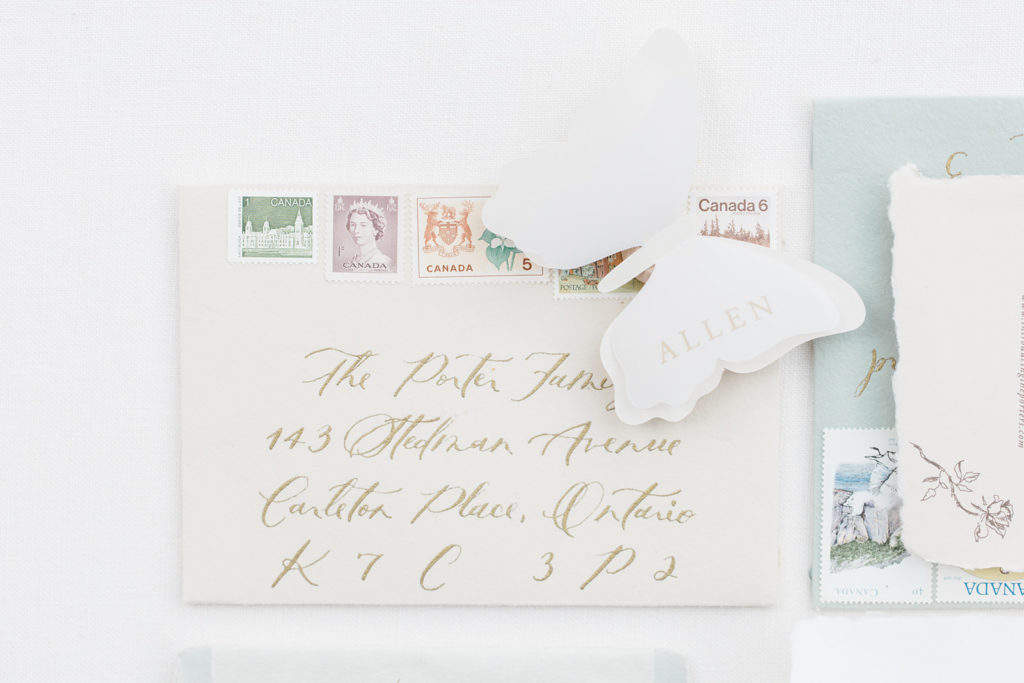 name place card paired with envelope as wedding invitation suite by Letterland Studio photographed by Brittany Navin Photography