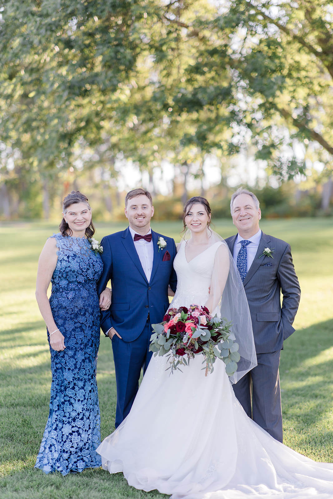 How to ensure your family portraits go smoothly on a wedding day. Photo taken at Arnprior wedding by Brittany Navin Photography