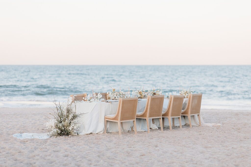 Beach wedding table scape at the coastal opulence beach wedding editorial photographed by Brittany Navin Photography