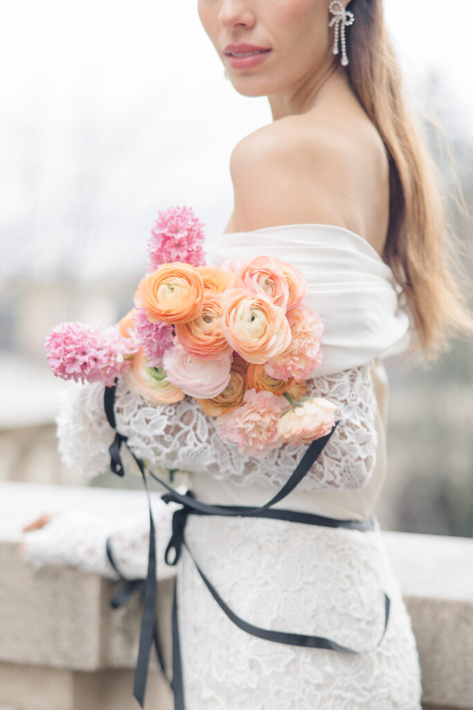 close up of bridal florals during Paris elopement photographed by Brittany Navin Photography