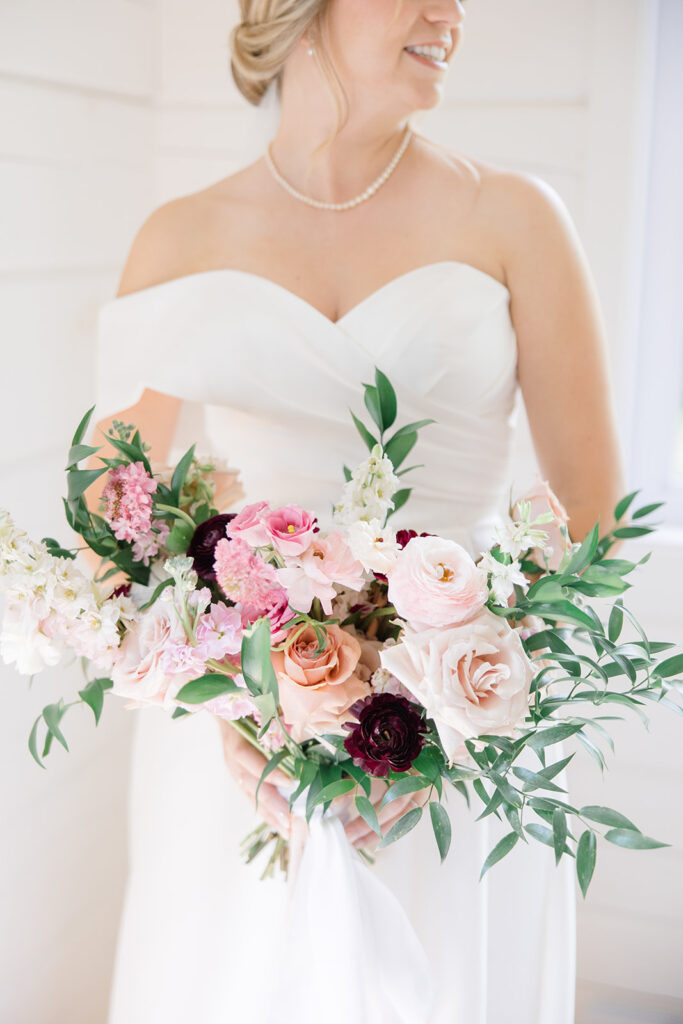 blush and burgandy bridal bouquet by Wild Bloem Studios photographed by Ottawa Wedding photographer Brittany Navin Photography