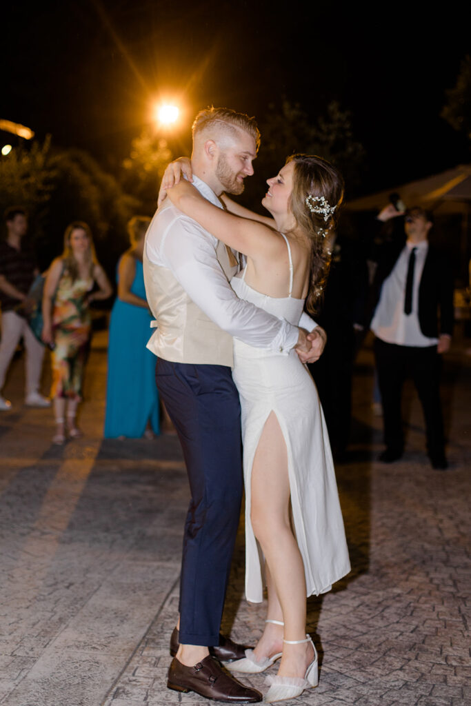 bride and grooms wedding last dance outdoors at Rome countryside wedding held at Tenuta La Porta Sul Lago photographed by Destination Wedding Photographer Brittany Navin Photography