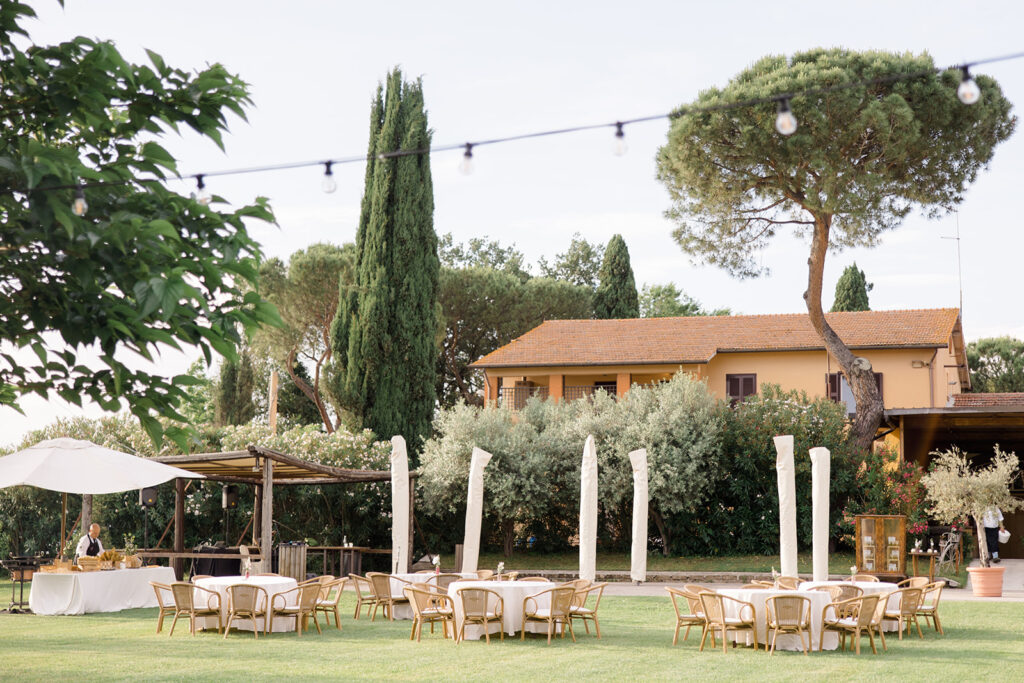 Outdoor Cocktail and wedding reception space at Rome countryside wedding held at Tenuta La Porta Sul Lago photographed by Destination Wedding Photographer Brittany Navin Photography