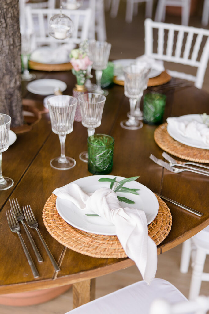 wedding reception place setting with olive green accents at Rome countryside wedding held at Tenuta La Porta Sul Lago photographed by Destination Wedding Photographer Brittany Navin Photography