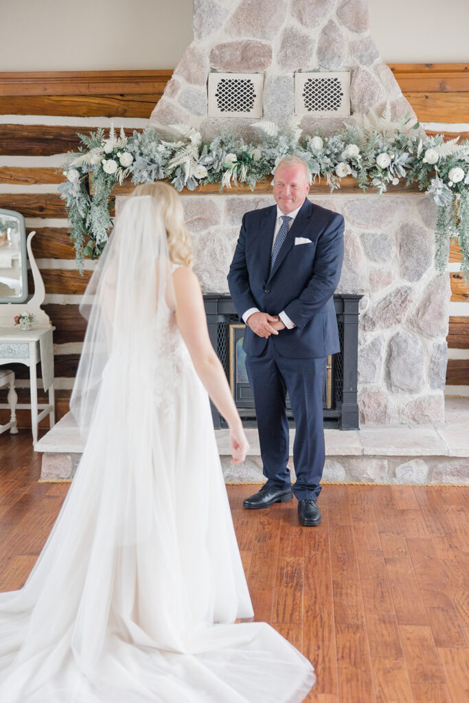 father-daughter first look at Stonefields Estate wedding photographed by Ottawa Wedding Photographer Brittany Navin Photography